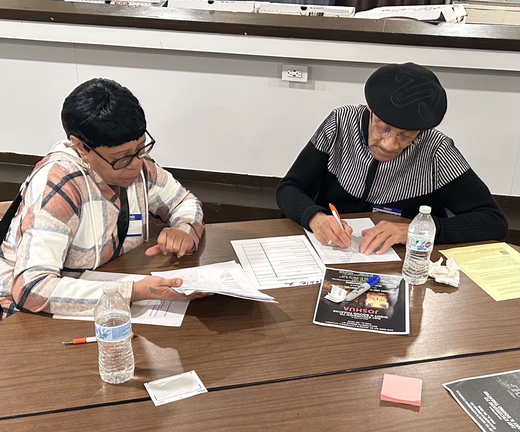 Members at work during a PA Solidarity Project meeting